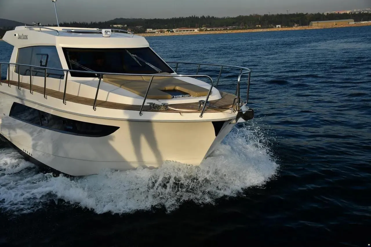 ERMAN YACHTING Comfort 36 cruising on open water, showcasing sleek design and performance.