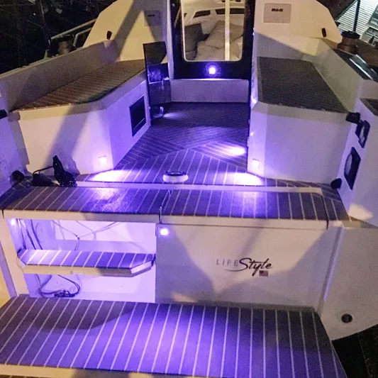  Yacht Photos Pics 2025 Faro Yachts 29 with illuminated deck and modern interior design.