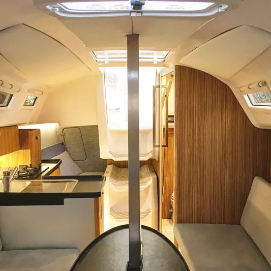  Yacht Photos Pics Interior of 2025 Faro Yachts 29, featuring modern design and cozy seating.