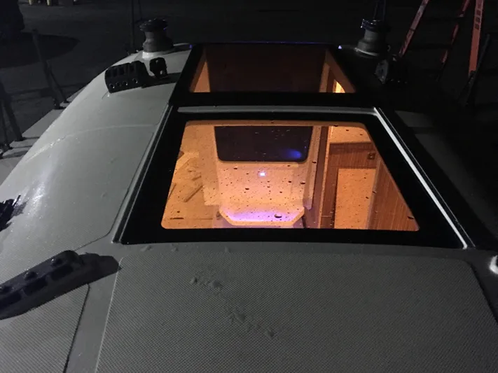  Yacht Photos Pics 2025 Faro Yachts 29 interior view through deck hatch at night.