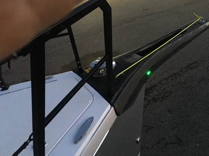  Yacht Photos Pics Bow of 2025 Faro Yachts 29 with green navigation light at dusk.