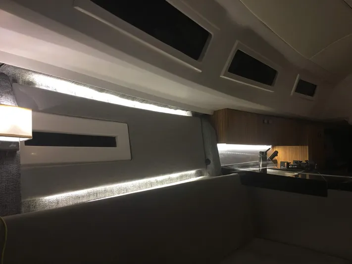  Yacht Photos Pics Interior of 2025 Faro Yachts 29, featuring modern lighting and sleek design elements.