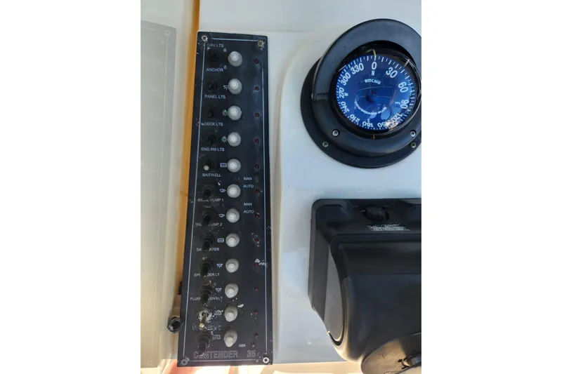 El Falcon Yacht Photos Pics Control panel and compass of 2008 Contender 35 Express Side Console boat.