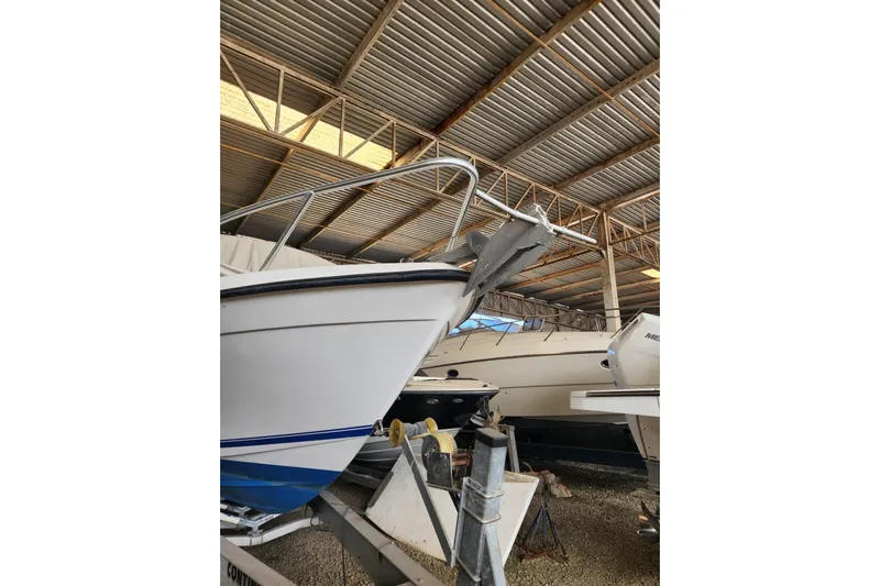 El Falcon Yacht Photos Pics 2008 Contender 35 Express Side Console boat in storage facility.