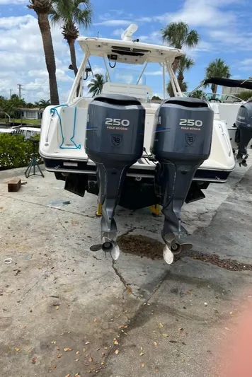 Relentless Yacht Photos Pics 2009 Pursuit S 310 Sport boat with twin 250 horsepower outboard motors.