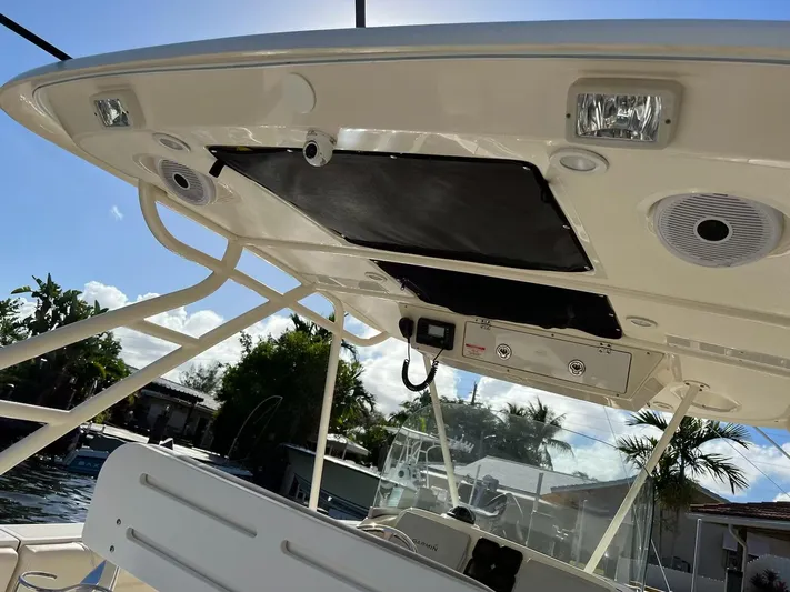 Relentless Yacht Photos Pics 2009 Pursuit S 310 Sport boat with T-top and electronics.