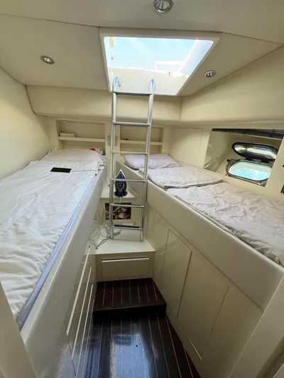 Mazag Yacht Photos Pics Interior of 2007 Arno Leopard 27 yacht with twin beds and skylight.