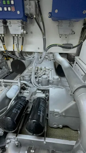 Mazag Yacht Photos Pics Engine room of 2007 Arno Leopard 27 yacht, showcasing mechanical components and wiring.