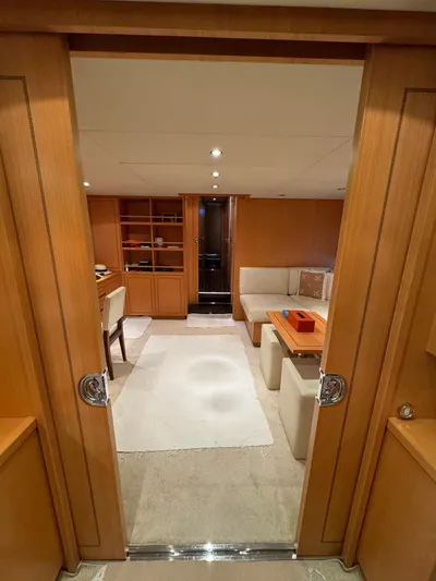 Mazag Yacht Photos Pics Interior of 2007 Arno Leopard 27 yacht with elegant wood paneling and modern furnishings.