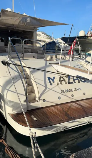 Mazag Yacht Photos Pics Luxury yacht Arno Leopard 27, 2007 model, docked in George Town marina.