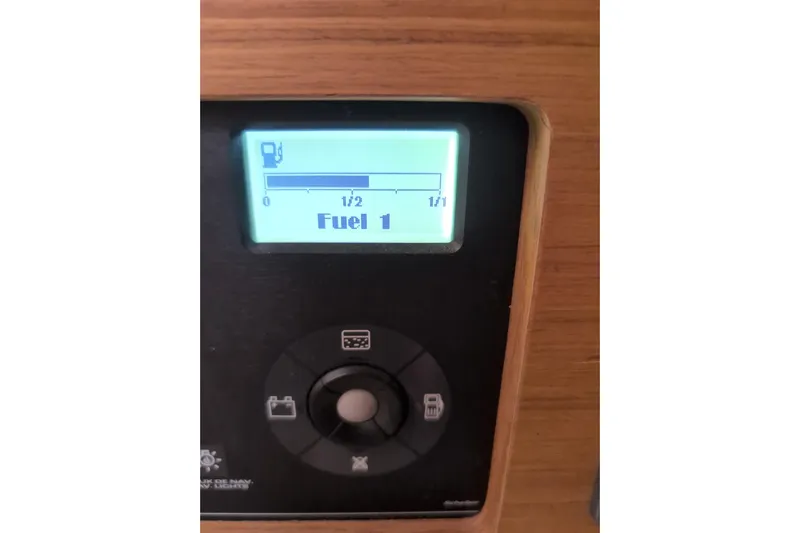  Yacht Photos Pics Fuel gauge display on 2009 Jeanneau Sun Odyssey 44i sailboat, showing half-full tank.