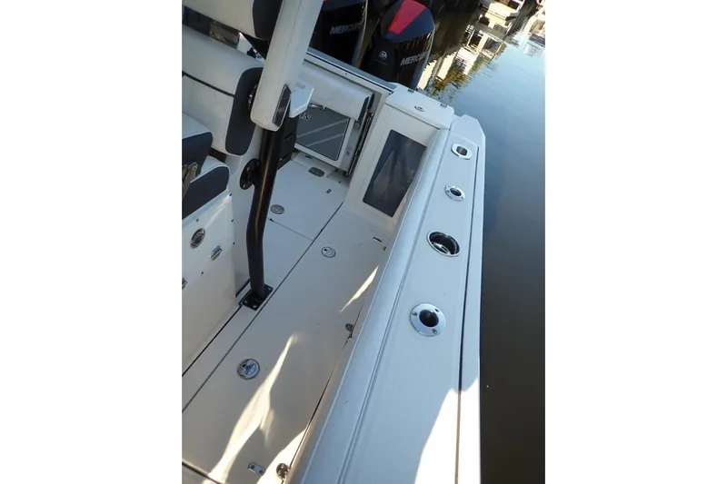  Yacht Photos Pics 2022 Blackfin 272 CC boat interior with seating and rod holders.