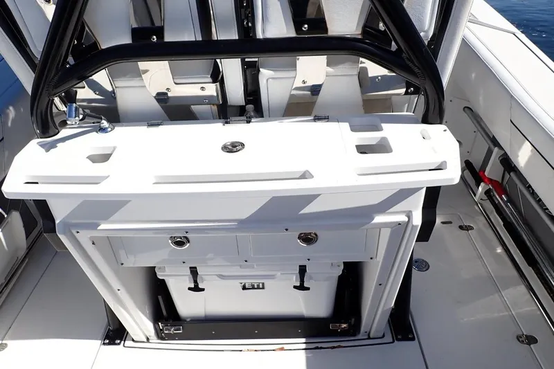  Yacht Photos Pics 2022 Blackfin 272 CC boat interior with seating and storage compartments.