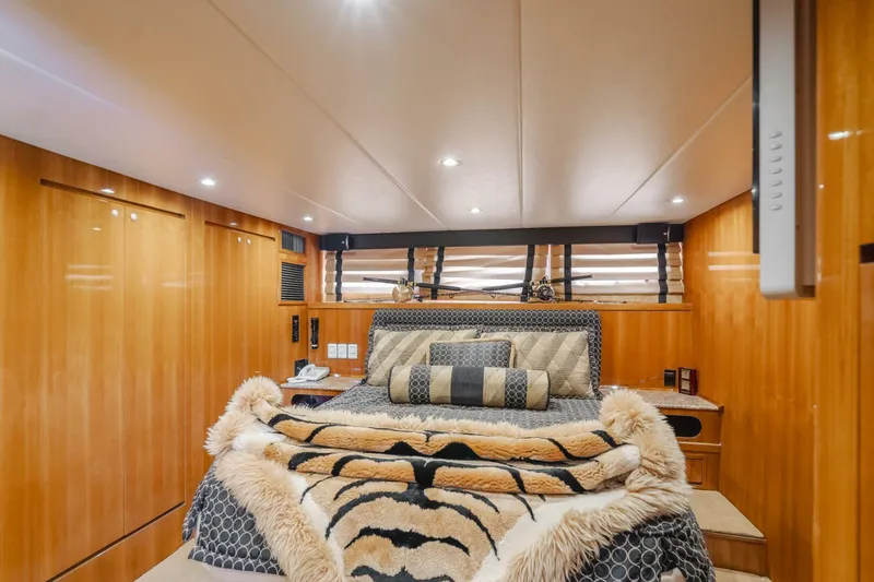 Fan Tail I Yacht Photos Pics Luxurious bedroom interior of 1988 Cheoy Lee 70 Enclosed Flybridge yacht.
