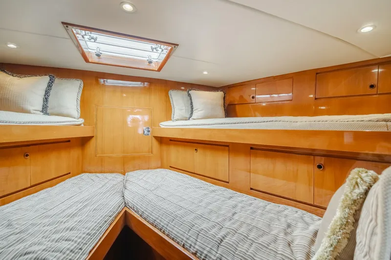 Fan Tail I Yacht Photos Pics 1988 Cheoy Lee 70 Enclosed Flybridge cabin with wooden interior and twin beds.