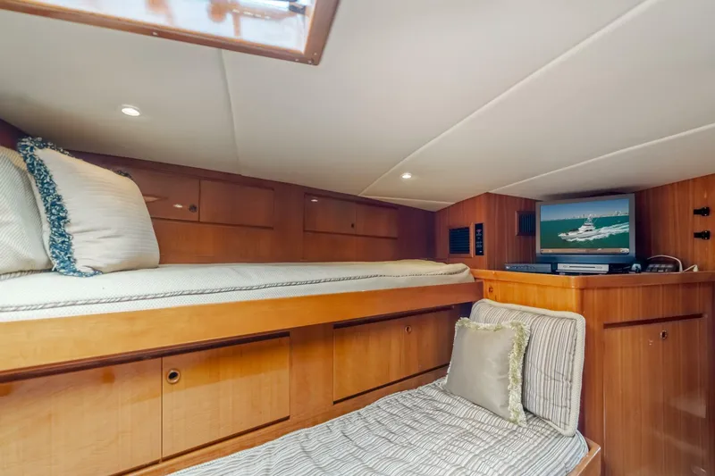 Fan Tail I Yacht Photos Pics 1988 Cheoy Lee 70 Enclosed Flybridge cabin with bunk beds and TV.