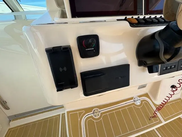  Yacht Photos Pics Control panel of 2022 Grady-White Express 370 boat with modern navigation equipment.