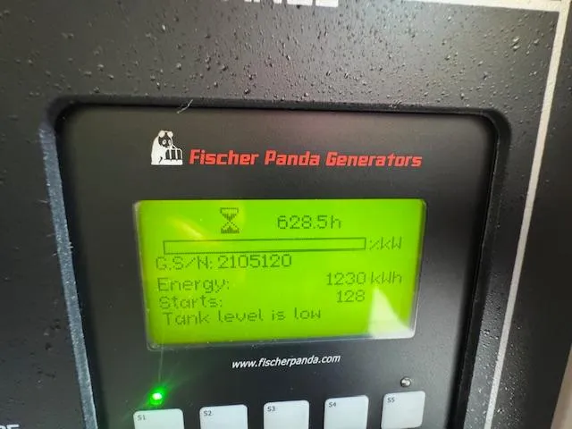  Yacht Photos Pics Fischer Panda generator display showing 628.5 hours, 1230 kWh energy, low tank level. Grady-White Express 370.