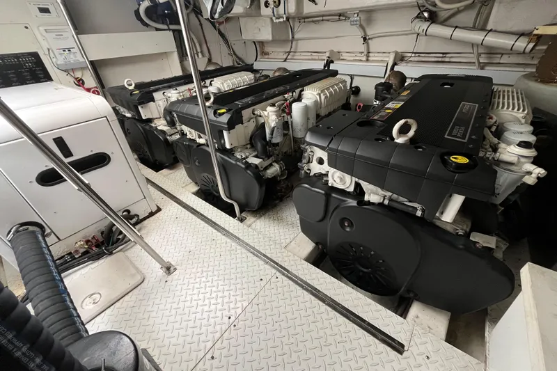 Dolcinea Yacht Photos Pics Engine room of 2010 Cruisers Yachts 520 Sports Coupe with dual engines and control systems.