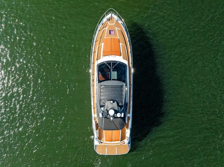 Po-sea-tive Vibez Yacht Photos Pics Aerial view of 2013 Azimut Atlantis 48 yacht on green water.