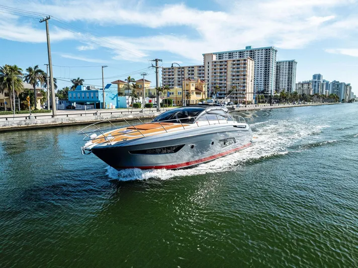 Po-sea-tive Vibez Yacht Photos Pics Azimut Atlantis 48 yacht cruising in a city canal, 2013 model.