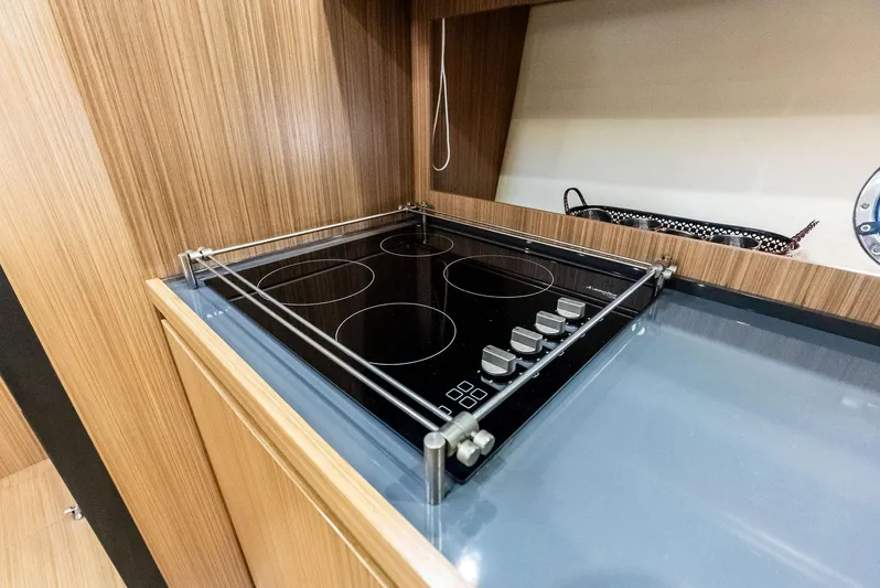 Po-sea-tive Vibez Yacht Photos Pics Modern kitchen stove in 2013 Azimut Atlantis 48 yacht interior.