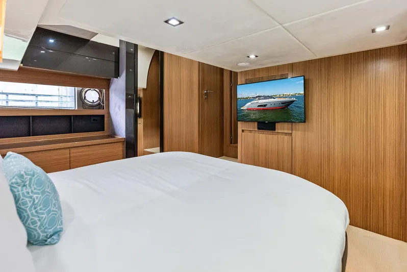 Po-sea-tive Vibez Yacht Photos Pics Luxurious cabin interior of 2013 Azimut Atlantis 48 yacht with modern amenities.