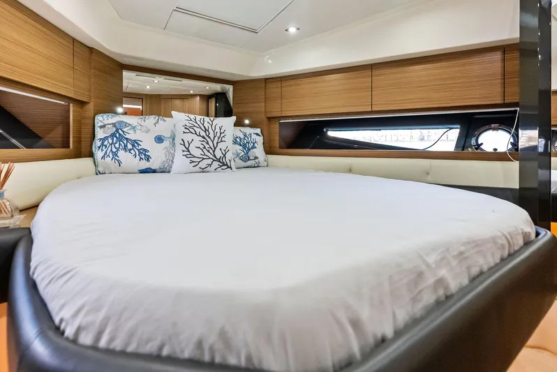 Po-sea-tive Vibez Yacht Photos Pics Luxurious bedroom interior of 2013 Azimut Atlantis 48 yacht with elegant bedding.