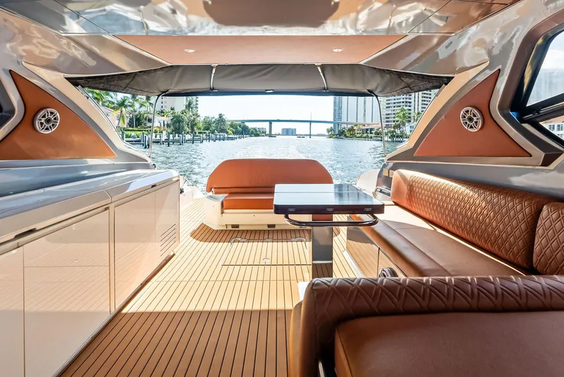 Po-sea-tive Vibez Yacht Photos Pics Luxurious 2013 Azimut Atlantis 48 yacht interior with elegant seating and scenic water view.