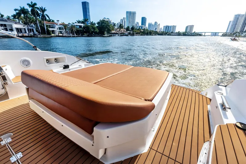 Po-sea-tive Vibez Yacht Photos Pics Azimut Atlantis 48 yacht deck with city skyline, 2013 model.