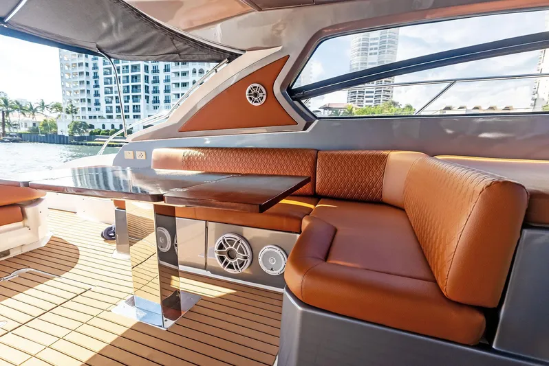Po-sea-tive Vibez Yacht Photos Pics Luxurious interior of 2013 Azimut Atlantis 48 yacht with leather seating and sleek design.