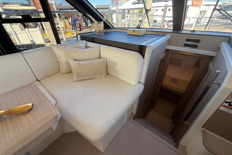  Yacht Photos Pics Luxurious interior of 2026 Prestige F4.3 yacht with plush seating and modern design.