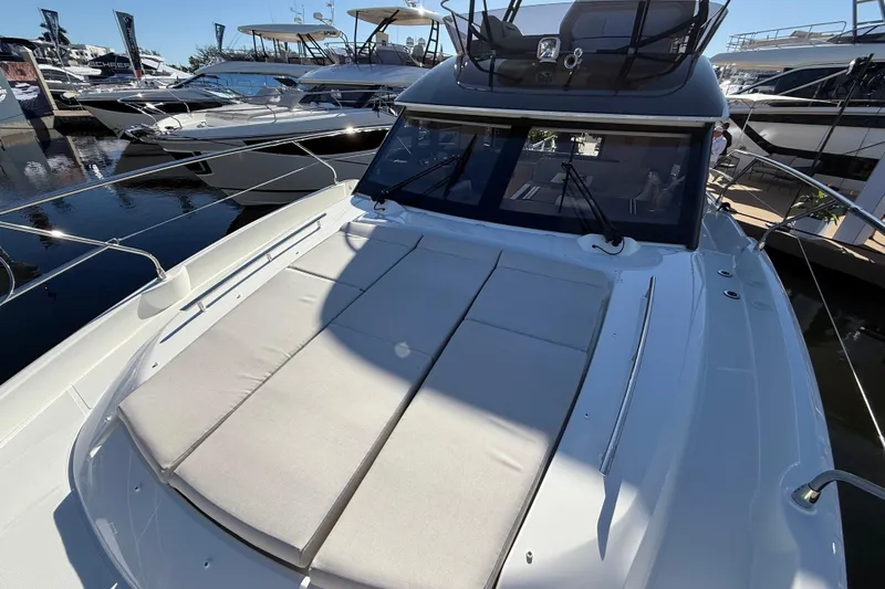  Yacht Photos Pics 2026 Prestige F4.3 yacht with sunbathing deck, docked at marina.