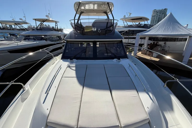  Yacht Photos Pics Luxury 2026 Prestige F4.3 yacht with spacious deck at marina.