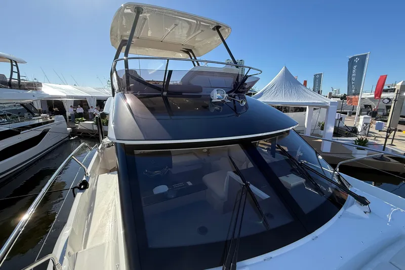  Yacht Photos Pics 2026 Prestige F4.3 yacht at a marina, showcasing sleek design and modern features.