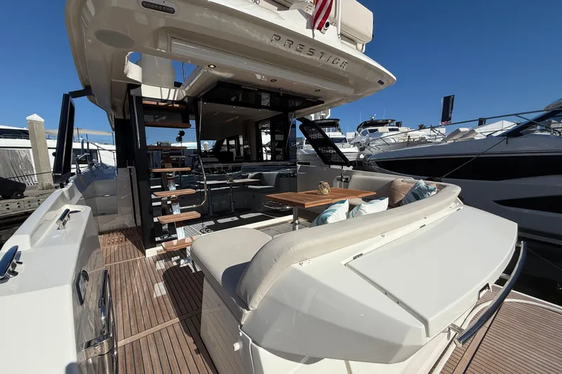  Yacht Photos Pics Luxurious 2026 Prestige F4.3 yacht with elegant outdoor seating and modern design.
