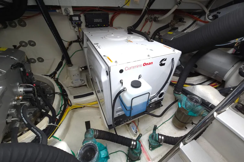 Grayson Yacht Photos Pics Engine room of 2017 Sabre 48 Fly Bridge with Cummins Onan generator.