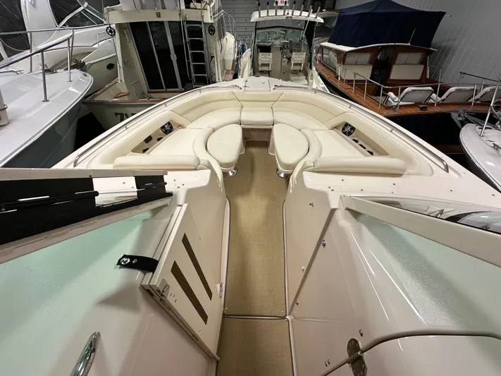  Yacht Photos Pics 2019 Grady-White Freedom 375 boat interior with spacious seating in a marina.