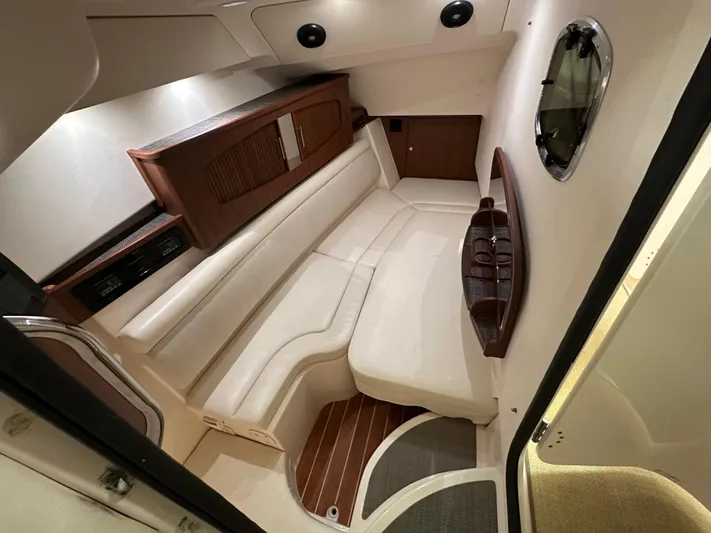  Yacht Photos Pics 2019 Grady-White Freedom 375 cabin interior with plush seating and elegant wood accents.