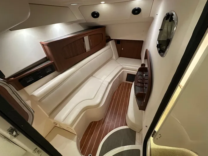  Yacht Photos Pics 2019 Grady-White Freedom 375 cabin interior with elegant seating and wood flooring.