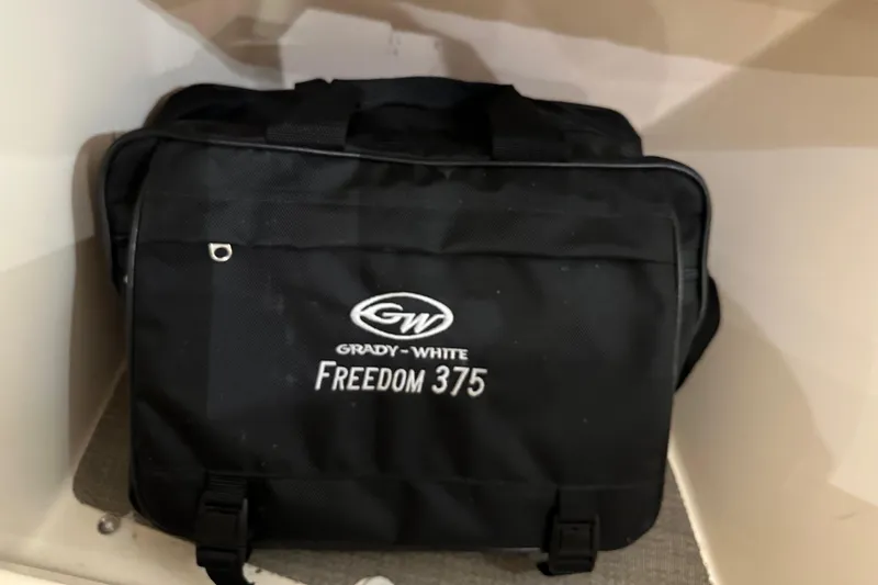 Yacht Photos Pics Black Grady-White Freedom 375 bag, 2019 model, inside a storage compartment.