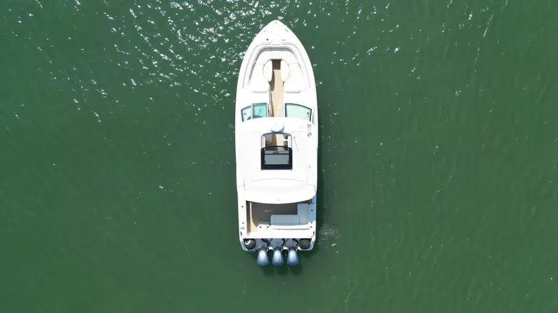  Yacht Photos Pics Aerial view of 2019 Grady-White Freedom 375 boat on green water.