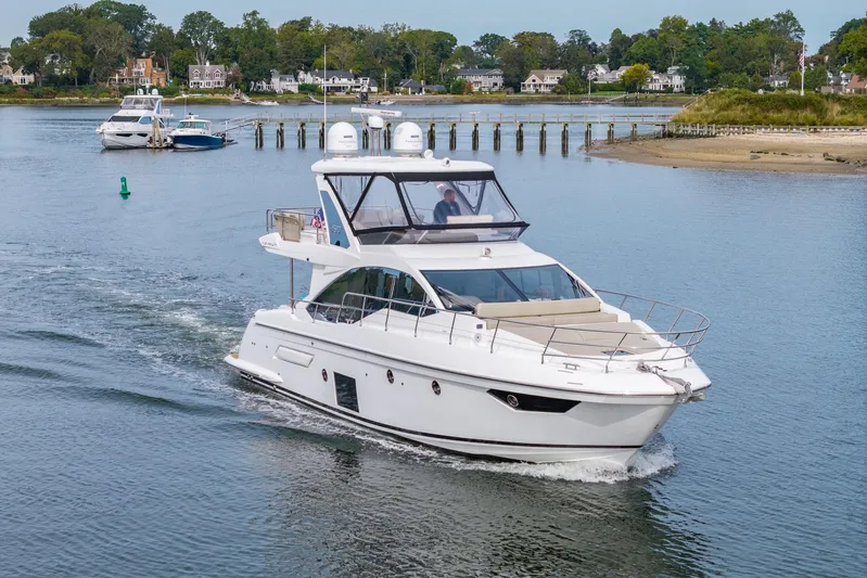  Yacht Photos Pics Azimut Fly 50 yacht cruising in a serene coastal area, 2020 model.