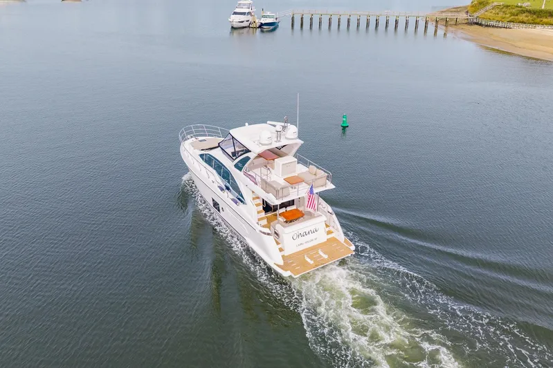  Yacht Photos Pics Azimut Fly 50 yacht cruising on calm waters, 2020 model.