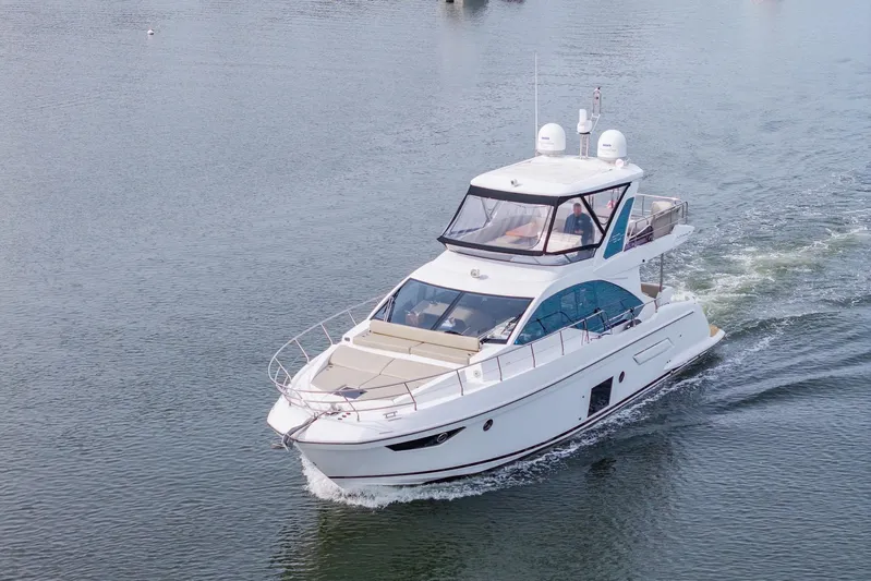  Yacht Photos Pics Luxury 2020 Azimut Fly 50 yacht cruising on calm waters.