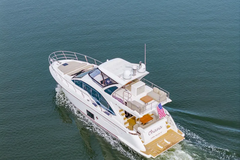  Yacht Photos Pics Aerial view of 2020 Azimut Fly 50 yacht cruising on calm waters.