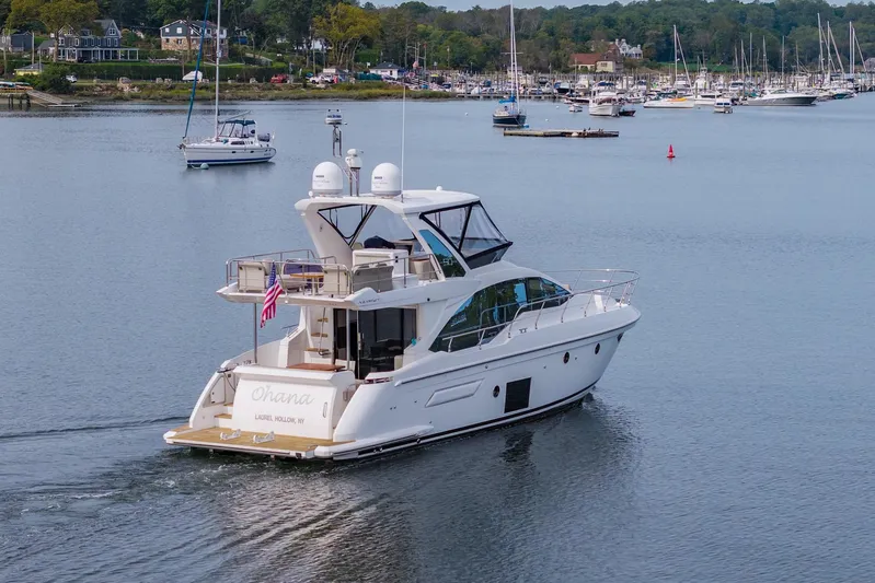  Yacht Photos Pics Azimut Fly 50 yacht cruising in a scenic harbor, 2020 model.