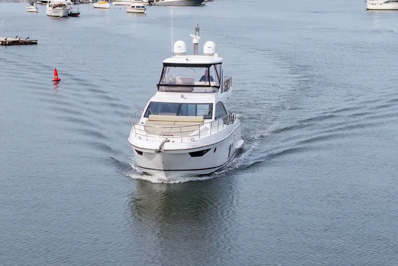  Yacht Photos Pics Azimut Fly 50 yacht cruising on calm waters, 2020 model.