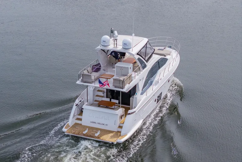  Yacht Photos Pics Azimut Fly 50 yacht cruising on water, rear view, 2020 model.