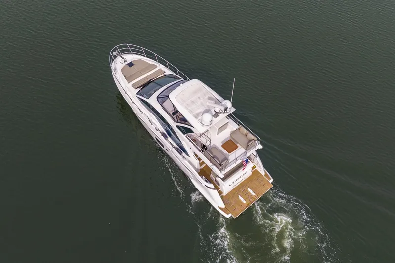 Yacht Photos Pics Aerial view of 2020 Azimut Fly 50 yacht cruising on calm water.